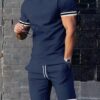 S29691c4393ba48aa8c3d42f870d02e42N.jpg EUROPEAN AND AMERICAN MEN'S SUMMER MEN'S LOOSE SET SHORT SLEEVED SHORTS SPORTS CASUAL ROUND NECK TWO-PIECE SET MEN'S S-3XL