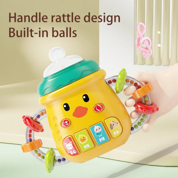 S5a4cd31f315a4c978cdd0391715dd883r.jpg 0-12M Baby Musical Feeding Bottle Pacifier Newborn Soft Teether Rattles Educational Toy Mobile Soothing Vocal Music Rattles Toys