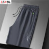 S6292e7a9d7434453b81c3f1932f2f734w.jpg Loose Casual Shorts Men Sports Quick Dry Training Running Short Pants Gym Shorts Men Workout Bottom Man Summer Board Short Pants