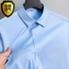 S735aa20e6e2e4910bd2e7eb2a1bd029eo.jpg Big Size 5XL Business Shirts For Men Long Sleeve Autumn Wrinkle-free Slim Fit Camisa Social Formal Soft Wedding Office White Top