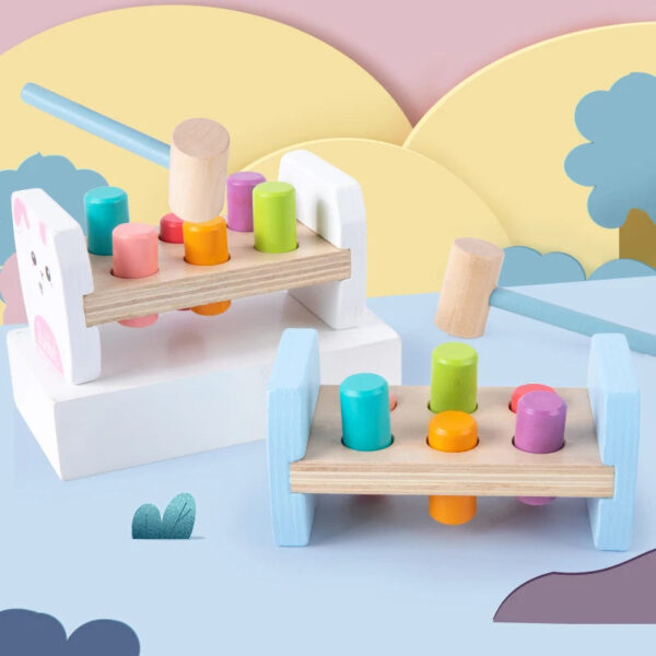 S74c64240aa0b40e2b40b89bf0dd4d69a7.jpg Wooden Colorful Pounding Toy Features assorted colorful pegs and a wooden hammer Kids have a blast hammering away