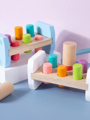 S75bb65b0e6654f48a2e38d8571c6ec3cX.jpg Wooden Colorful Pounding Toy Features assorted colorful pegs and a wooden hammer Kids have a blast hammering away