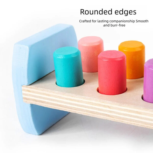 S868e86b664ce48dd90e04133033e7a16g.jpg Wooden Colorful Pounding Toy Features assorted colorful pegs and a wooden hammer Kids have a blast hammering away