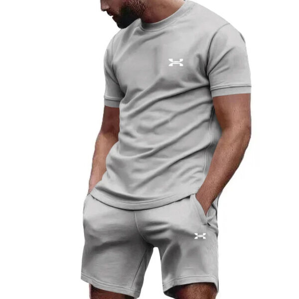 Sd8c3e3a7c84844ff857c7b4d78d2f4d1A.jpg New summer men's casual shortsleeved shorts 2-piece city street fashion T-shirt shorts suit men's cool run hot sale