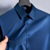 Sdddce23449034a6bbebb5272de950422O.jpg Big Size 5XL Business Shirts For Men Long Sleeve Autumn Wrinkle-free Slim Fit Camisa Social Formal Soft Wedding Office White Top